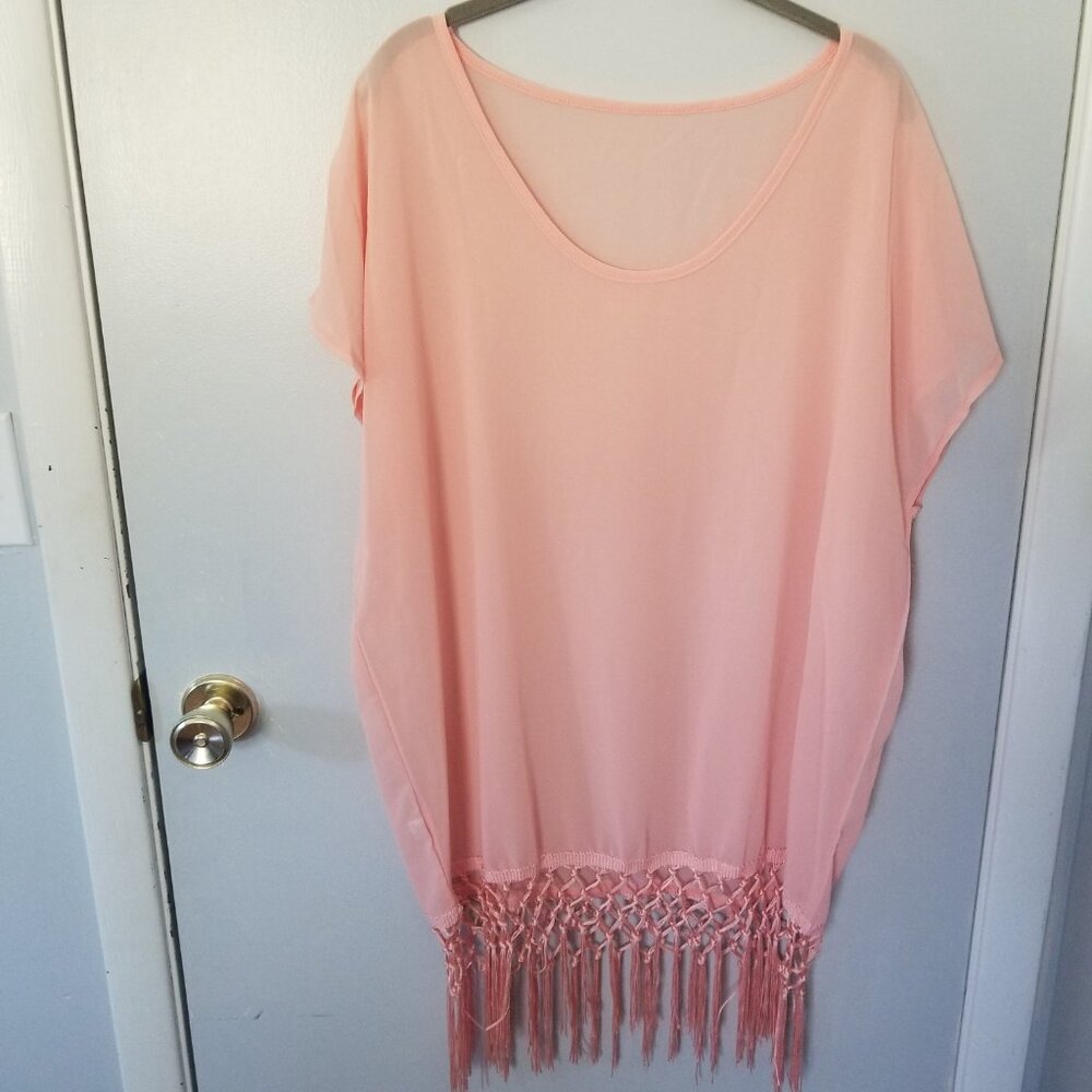 Sheer pink swimsuit coverup with tassels